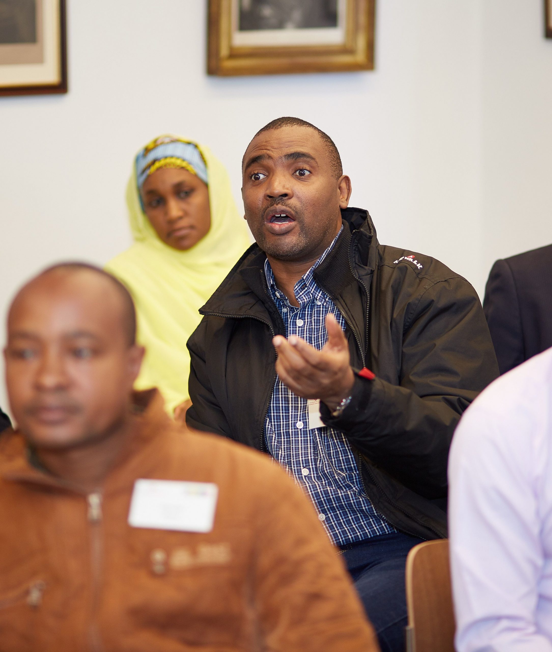 RCO Day 3_crop a man asks a question at a meeting